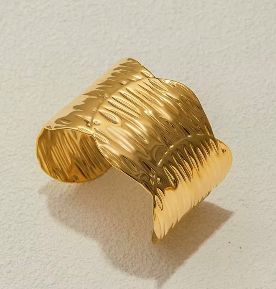 18 karat forgyldt bangle I stål