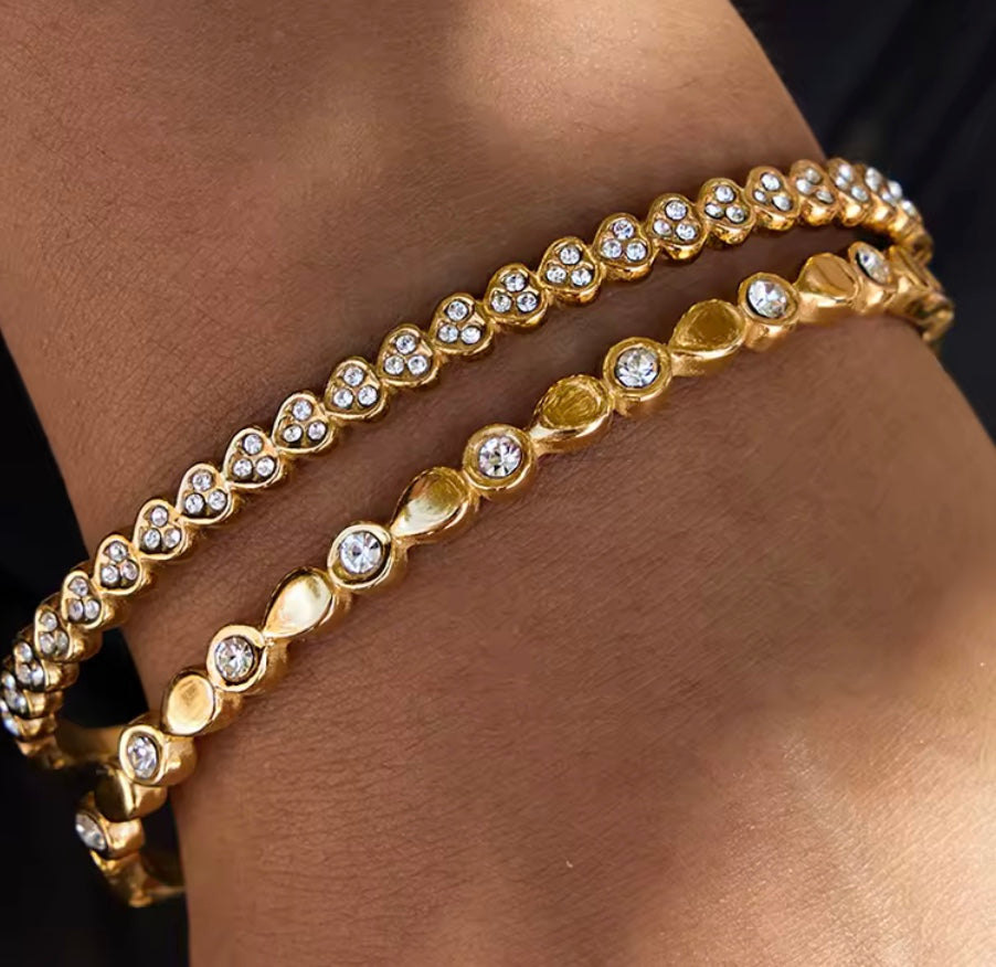 18 karat forgyldt armbånd i stål med zirkoner