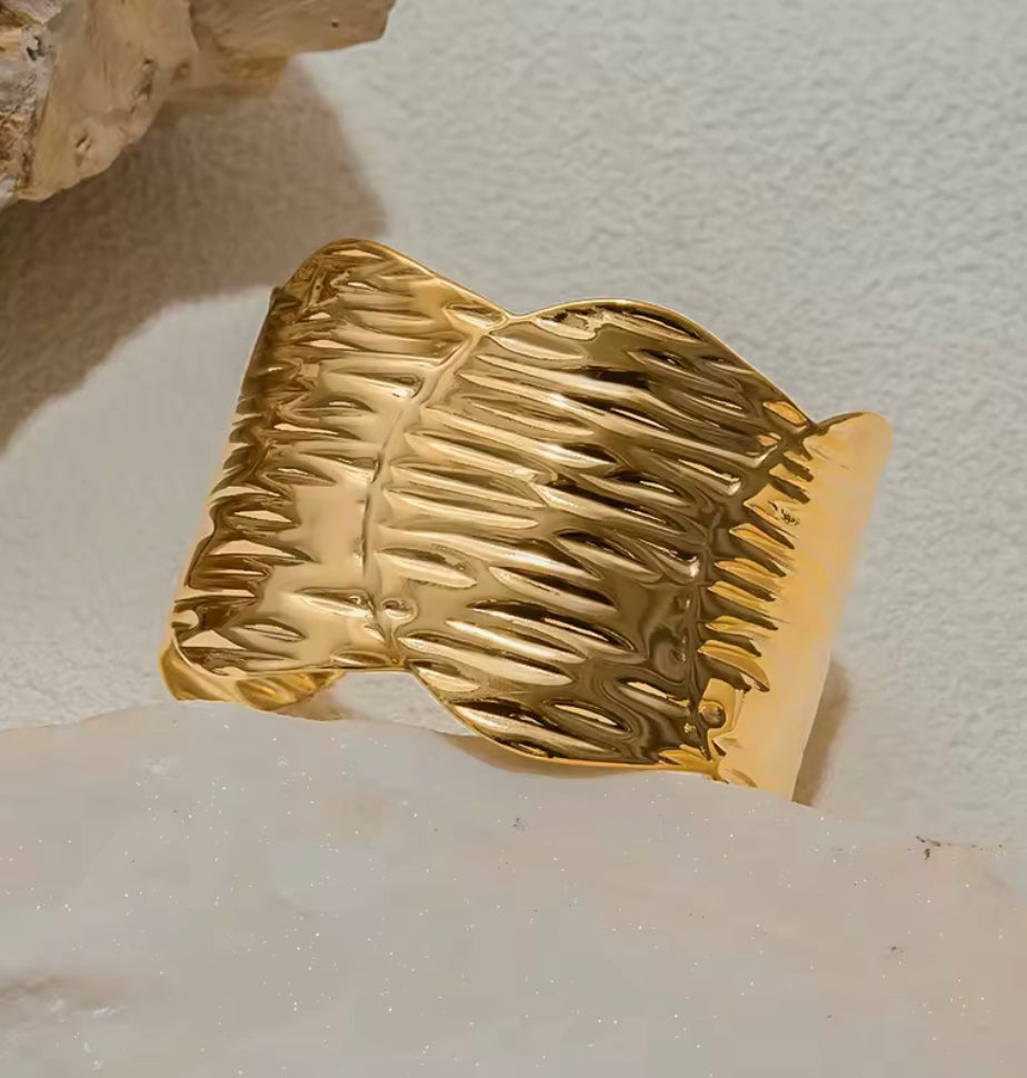 18 karat forgyldt bangle I stål