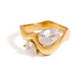 18 k forgyldt ring med zirkoner