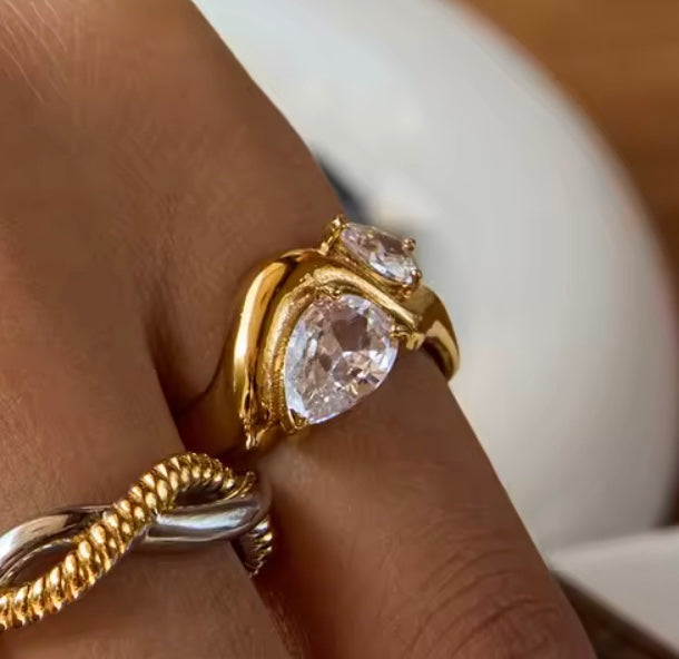 18 k forgyldt ring med zirkoner