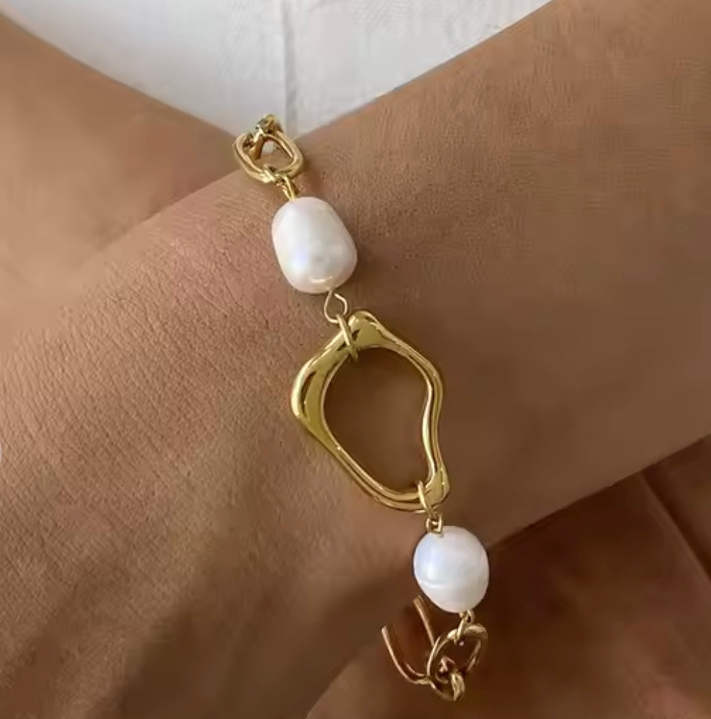18 karat forgyldt armbånd i stål med perler