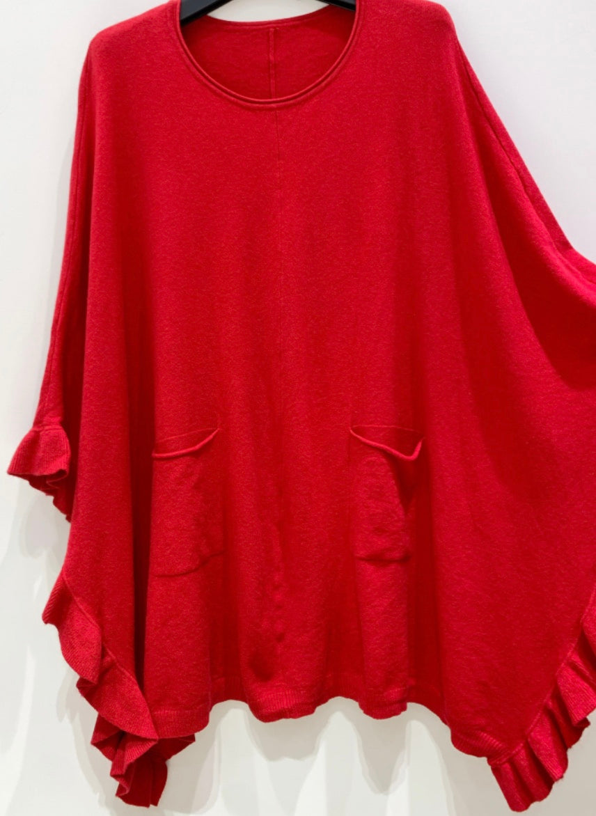 Poncho med volang