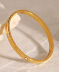 18 karat forgyldt bangle med hjerter og zirkoner