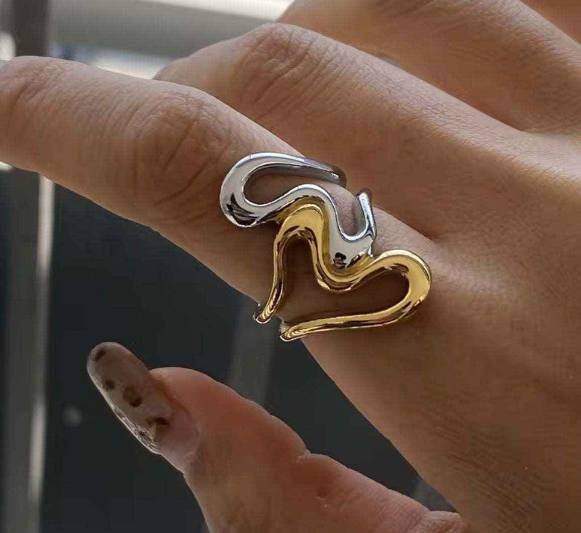 18 k forgyldt ring i stål "hjerter"