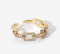 18 k forgyldt ring med zirkoner i messing