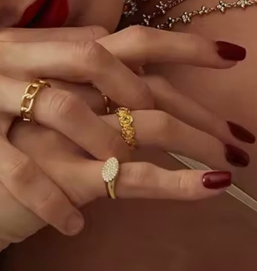 18 k forgyldt ring med zirkoner i flere farver