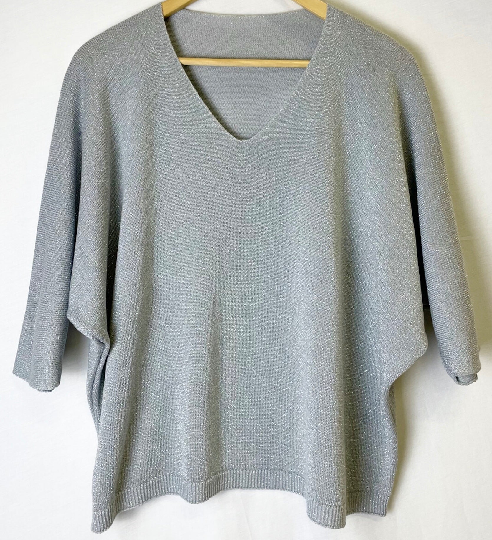 Shiny strikket bluse med flagremusærmer