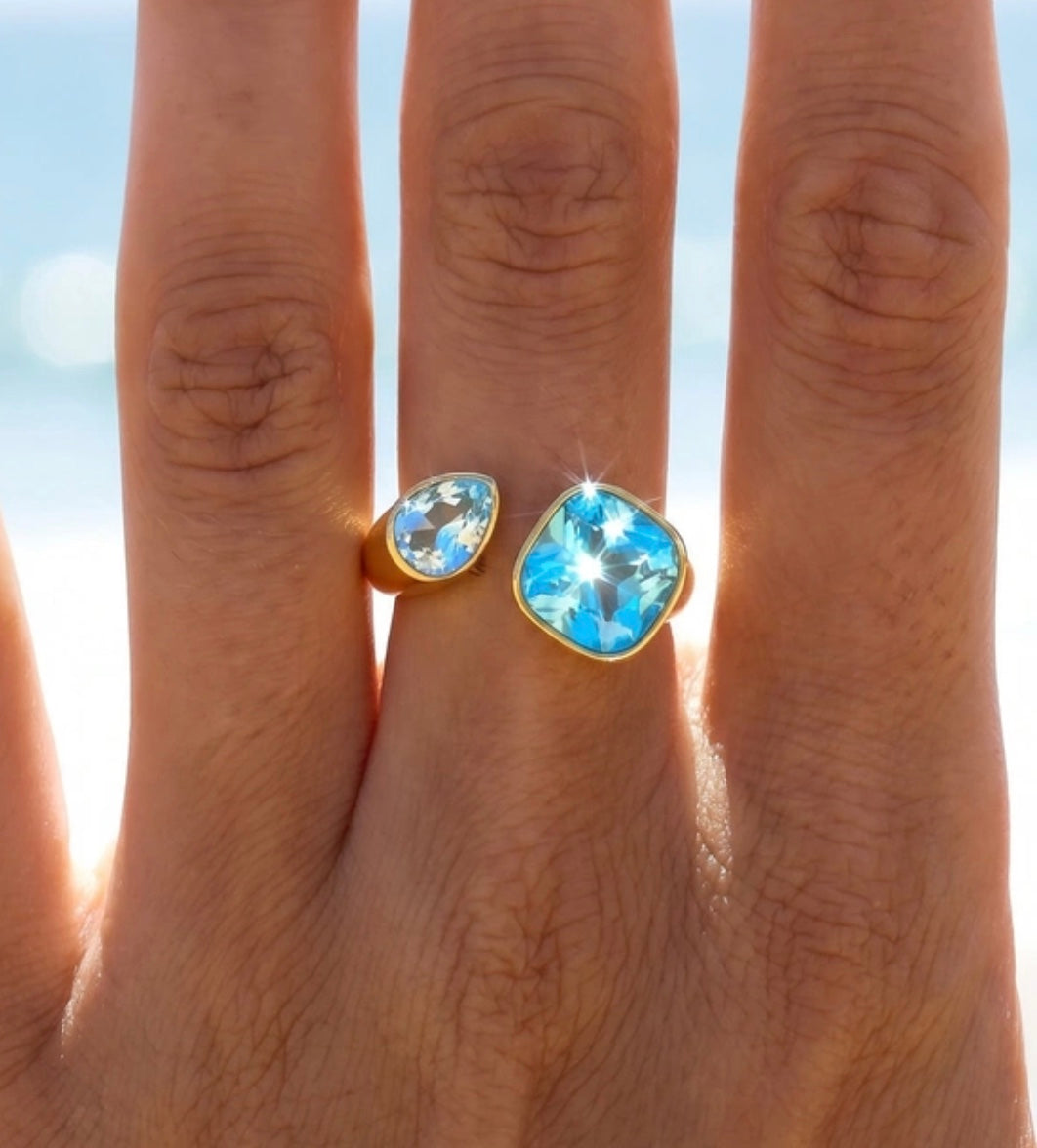 Åben ring i stål med sten