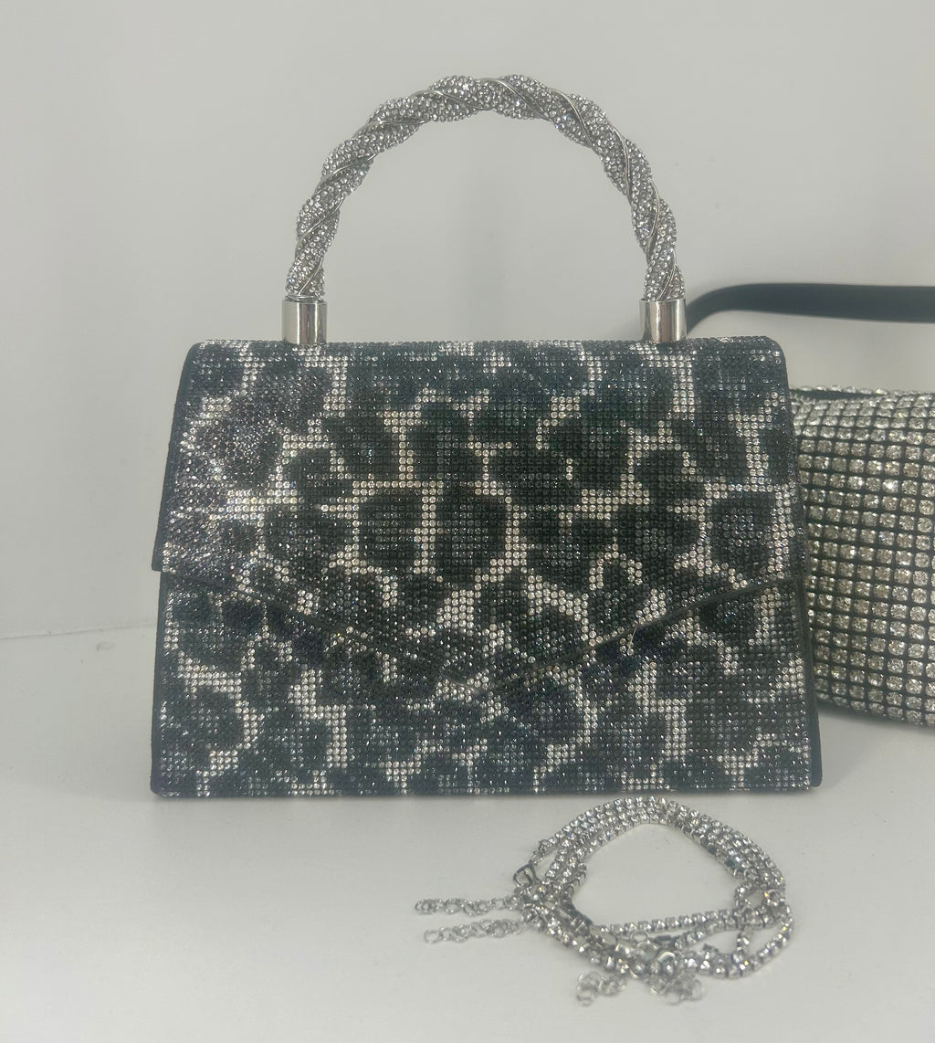 Liten clutch med stenar och leopardtryck